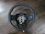 Genuine Ford Steering Wheel Only Rubber (no Controls). Fixed Price $100.00.