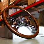 18" Dark Wood Chrome Steering Wheel 4 Spoke Big Rig Semi Truck No Hub Adapter. Fixed Price $179.99.