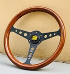 Universal Heritage Indy Black Woodgrain Mahogany Steering Wheel 350MM. Fixed Price $98.10.