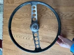 Volvo P1800 Steering Wheel - Old And Tired. Fixed Price $150.00.
