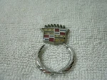 Cadillac Wreath & Crest Emblems--trim Part Plastic----original-pre 1990'S. Fixed Price $10.00.