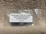 Nos S8MS-3649A 1968 Shelby Mustang Cobra Steering Wheel Center Emblem Repop. Fixed Price $125.00.