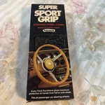 New Vintage 1981 Super Sport Grip Steering Wheel Wrap Cover Nos Black 22-1016-9. Fixed Price $45.00.