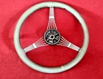 Ford Banjo Steering Wheel - Leather (?) Padded. Fixed Price $300.00.