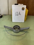 1964 Chevy Impala Steering Wheel Chrome Horn Center. Fixed Price $50.00.