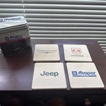 New Mopar Master Parts Ceramic Coasters Set 4 Jeep Dodge Chrysler Tin Box Nos. Fixed Price $45.00.