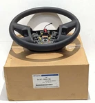 New Oem Ford Black Vinyl Cruise Audio Steering Wheel 2008-2012 Escape Mariner. Fixed Price $150.00.