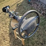 95 1994-1996 Cadillac Fleetwood Brougham Steering Column Wheel Tan Rwd. Fixed Price $450.00.