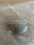 Chrome With Taupe Steering Wheel Horn Cap For 1947-1953 Chevy Pickup Trucks. Fixed Price $60.00.