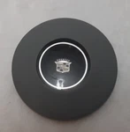 ** ( ) Vintage 1984-1988 Cadillac Cimarron Steering Wheel Horn Button. Fixed Price $75.00.