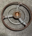 Accessory 1939-40 Packard Curved Spokes Banjo Steering Wheel/horn. Fixed Price $2000.00.